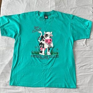 Screen Stars - National Cow Calling Teal tee